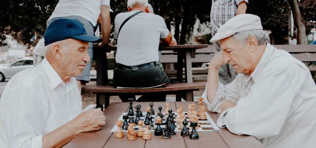 Old men playing chess.